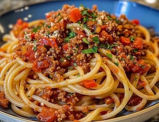 Homemade Spaghetti prepared at home with simple ingredients and clear steps.