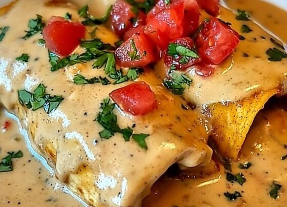 Boudin Chimichangas with Crawfish Cream Sauce prepared at home with simple ingredients and clear steps.